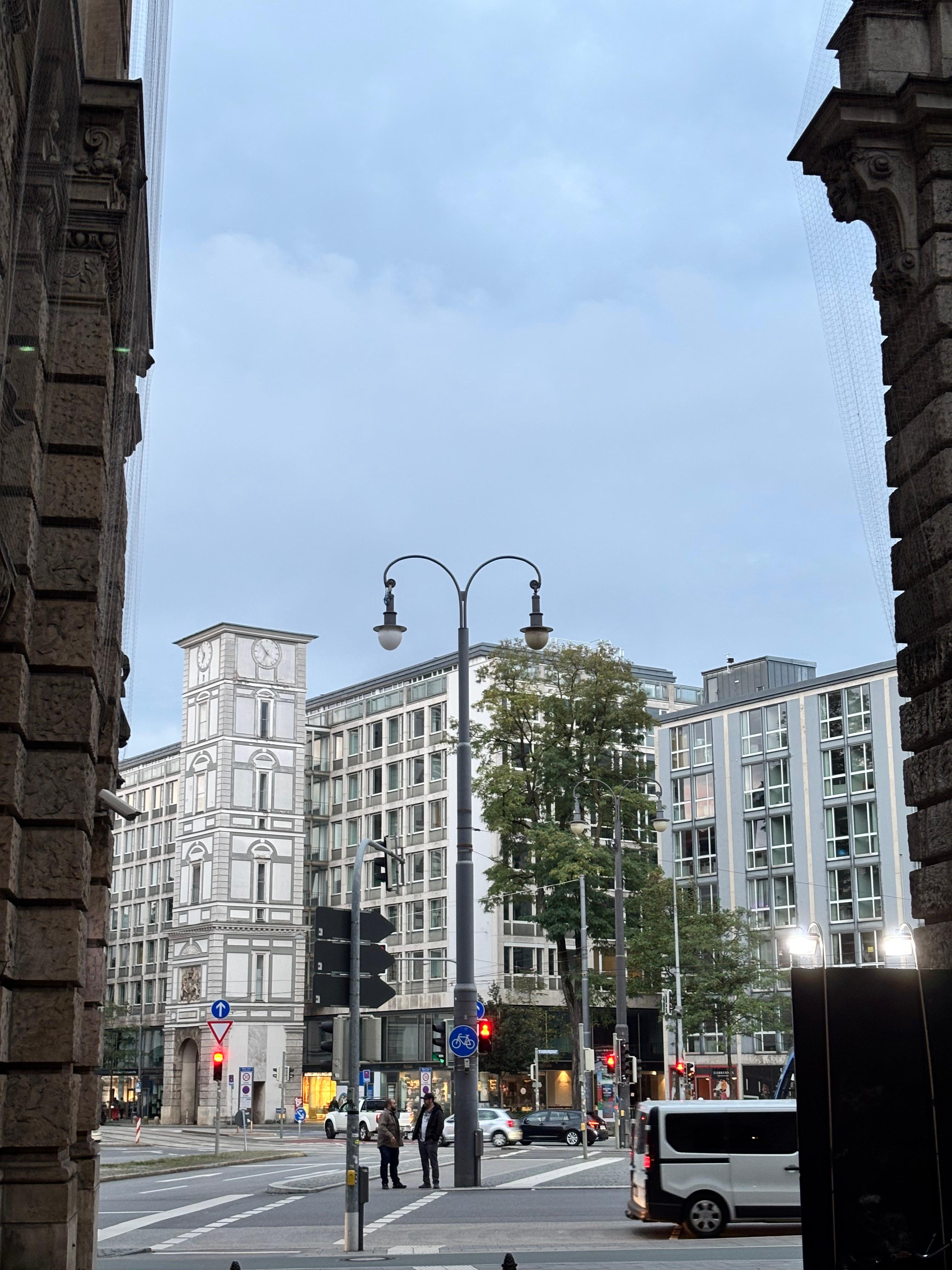Street view looking up at a baroque church tower