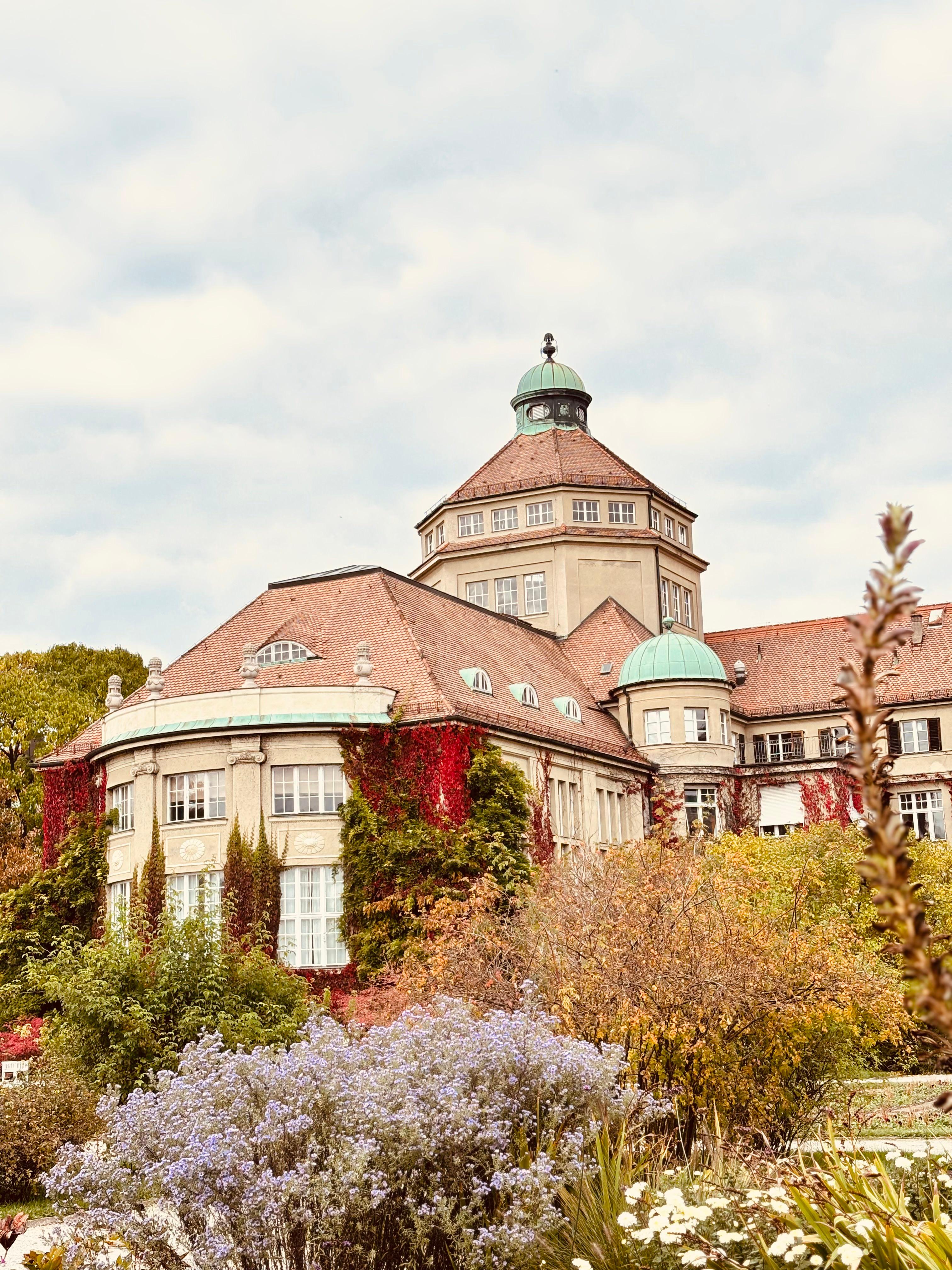 Munich Botanical Garden domed building covered in autumn ivy