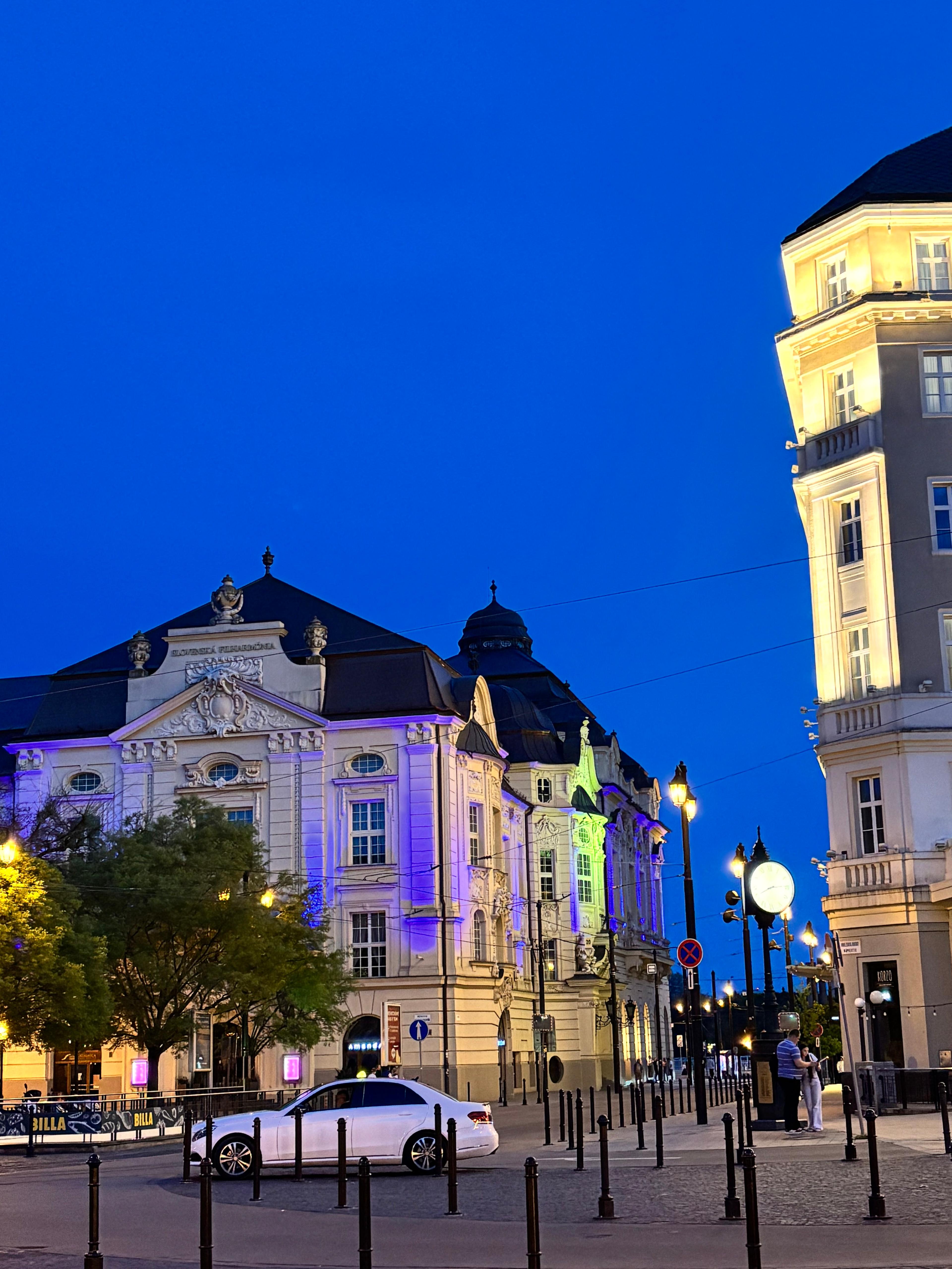 Bratislava Main Square with baroque buildings lit at night
