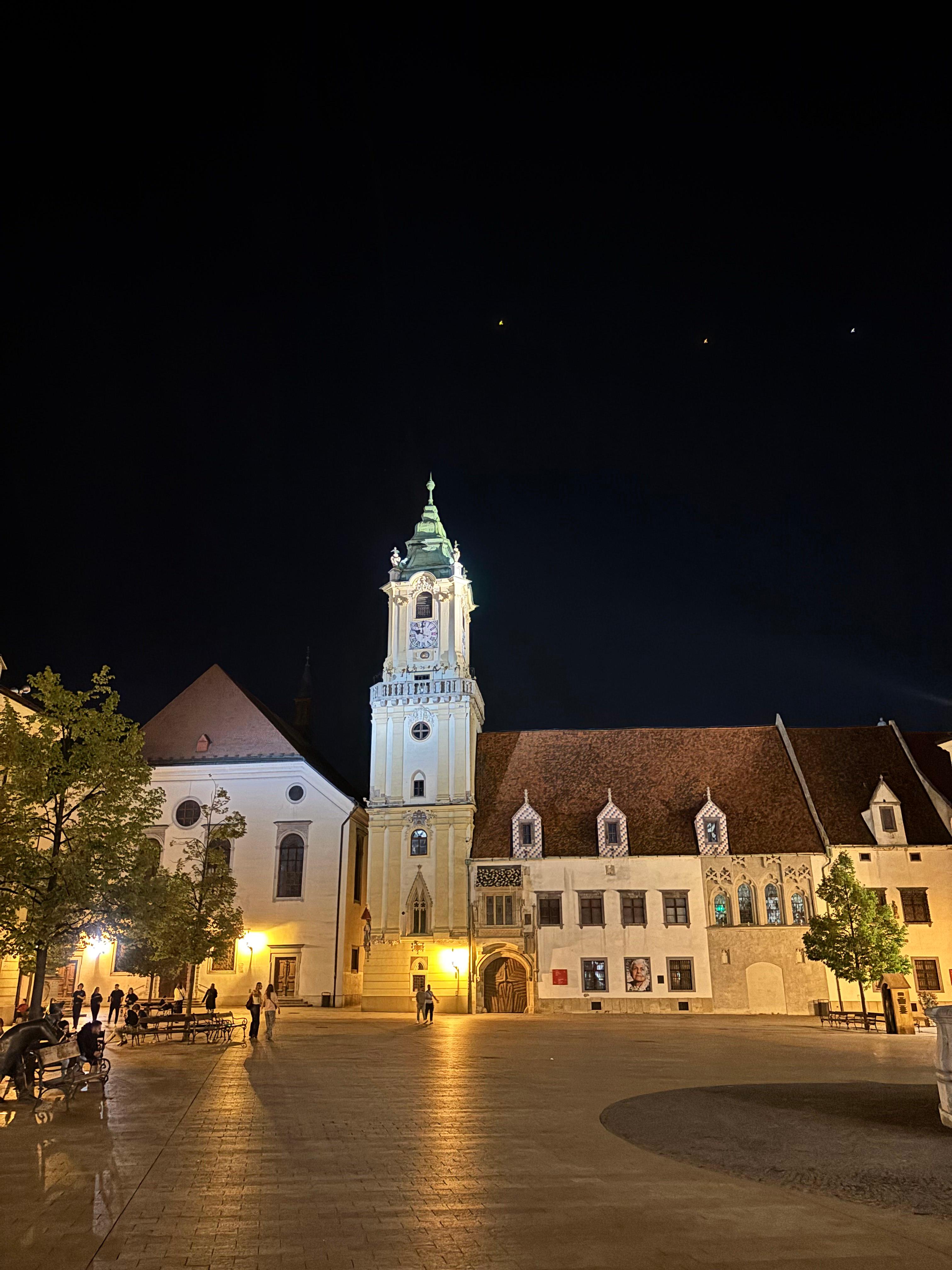 White baroque church illuminated at night
